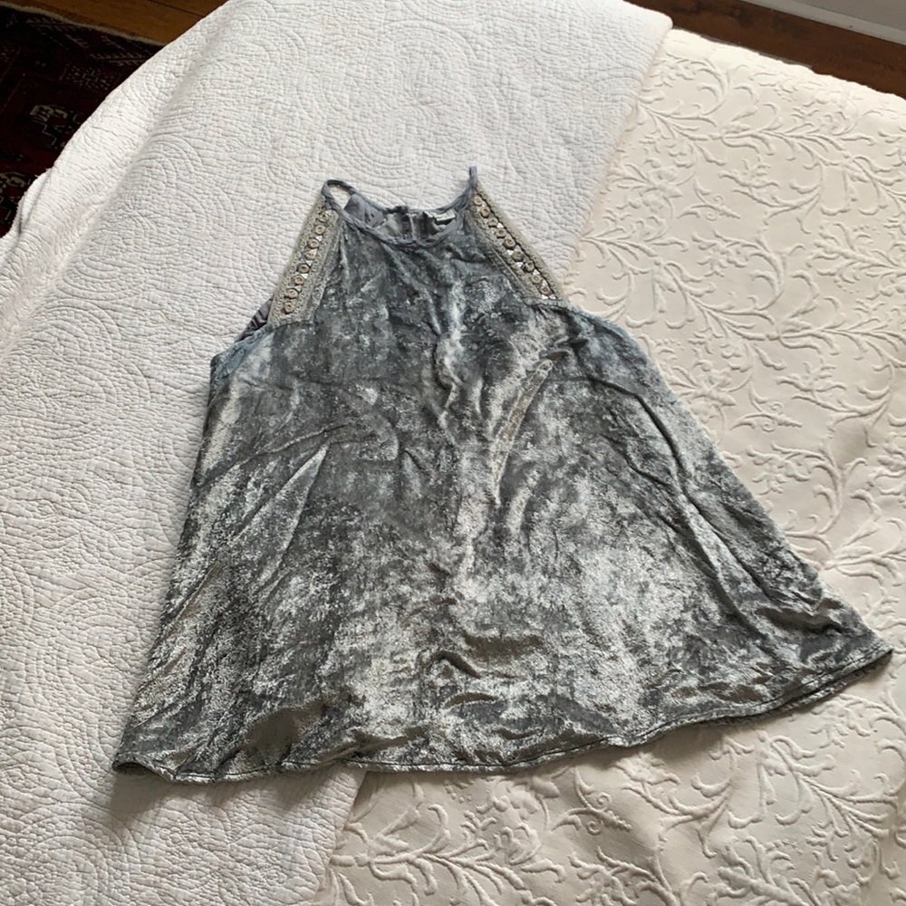 The brand is Anthropologie size SMALL color grey